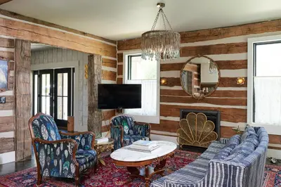 a living room with a couch and chairs and a table at Grill and Fire Pit Eclectic Ulster County Cabin in Pine Bush