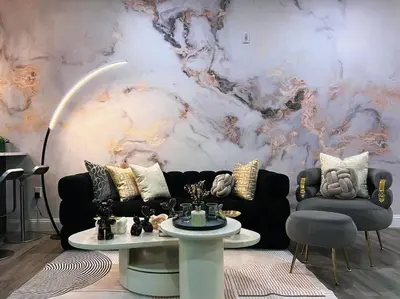 a living room with a couch and a marble wall at Spacious & Stylish 2BR 2BA - Easy NYC Commute in Jersey City