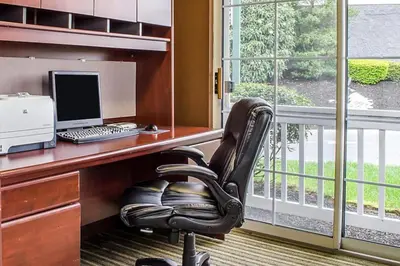 an office with a desk with a computer and a chair at Smell the Chocolate from Hershey Park in this great resort 2BD vacation condo in Hershey
