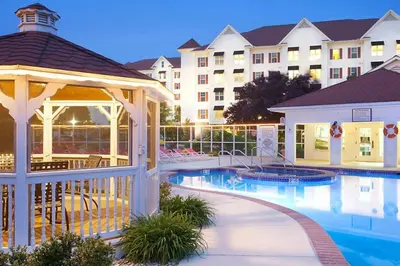 a swimming pool with a gazebo and a hotel at Smell the Chocolate from Hershey Park in this great resort 2BD vacation condo in Hershey