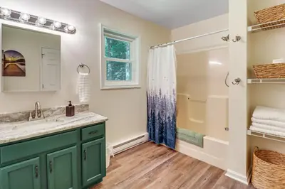 a bathroom with a sink and a shower at 7 Mi to Big Boulder Resort-Style Poconos Retreat in Albrightsville