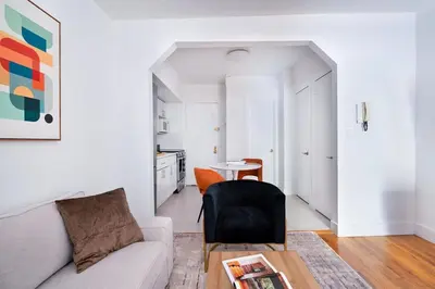 a living room with a couch and a table at 444-3A Newly renovated 1BR - Elevator Building in New York