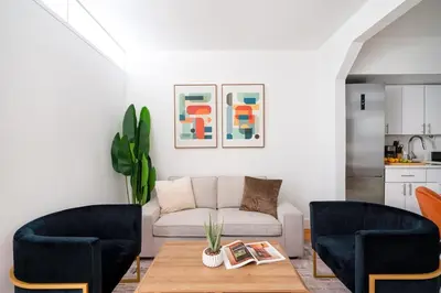 a living room with a couch and a table at 444-3A Newly renovated 1BR - Elevator Building in New York