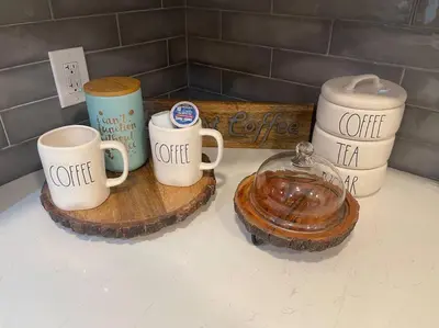 a counter with three coffee mugs on a cutting board at Welcome to our Retreat Haven in Warwick, NY in Warwick