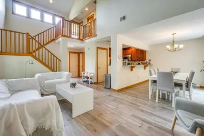 a living room with a couch and a table at Tannersville Resort Home with Deck and Gas Grill! in Tannersville