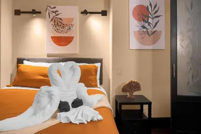 a bedroom with a bed with a towel on it at Stunning Condo in Heart of New York with GYM & MORE in New York