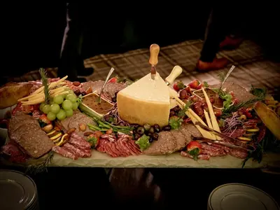 a plate of food with cheese and meats and vegetables at Moselem Springs Golf Club in Kutztown