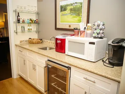 a kitchen counter with a microwave and a sink at Moselem Springs Golf Club in Kutztown