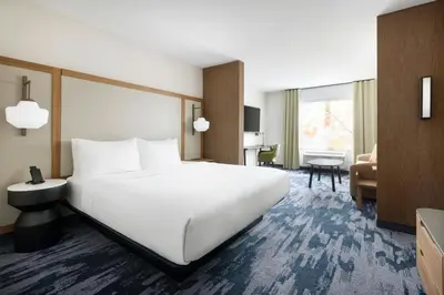 a large white bed in a hotel room at Fairfield by Marriott Inn & Suites Union in Union