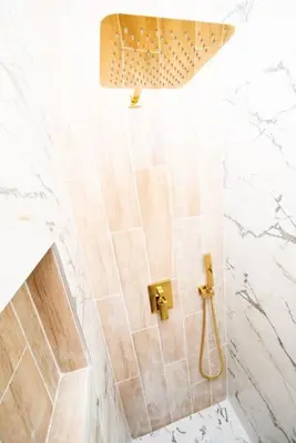a bathroom with a shower with a sink and a shower at Charming 2BR Apt Balcony Views of Darby Creek in Darby