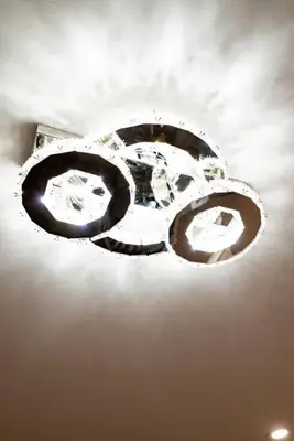 a light on the ceiling of a room at Charming 2BR Apt Balcony Views of Darby Creek in Darby