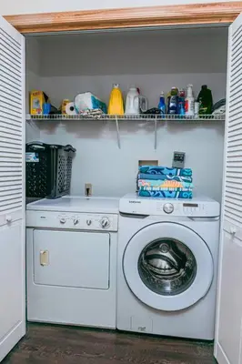 a laundry room with a washing machine in it at Gorgeous Cozy 5 Bedroom House with Hottub,Lake,Pool in Albrightsville