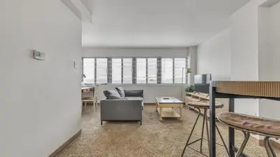 a living room with a couch and a table at PP 1506 Beautiful Professional 1br Apt, Pool in Harrisburg