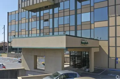 a building with a car parked in front of it at PP 1606 Beautiful Professional 1br Apt, Pool in Harrisburg