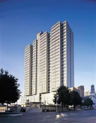 a large building with many windows in a city at PP 1606 Beautiful Professional 1br Apt, Pool in Harrisburg