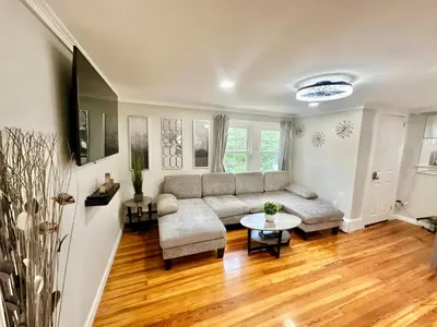 a living room with a couch and a table at Town & Country Andover, NJ Area Apt- 2nd FL in Andover