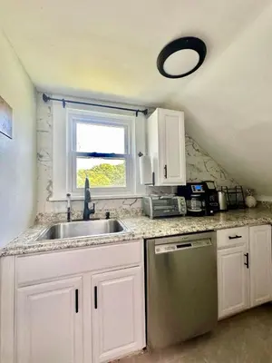a kitchen with a sink and a window at Town & Country Andover, NJ Area Apt- 2nd FL in Andover