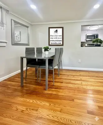 a dining room with a table and chairs at Town & Country Andover, NJ Area Apt- 2nd FL in Andover