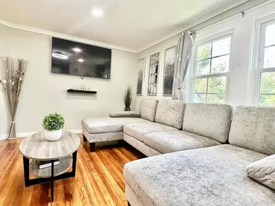 a living room with a couch and a table at Town & Country Andover, NJ Area Apt- 2nd FL in Andover
