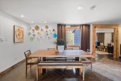 a dining room with a table and chairs at Green Acres Retreat in Hancock
