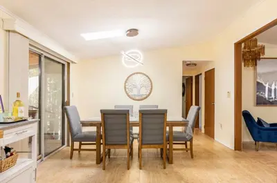 a dining room with a table and chairs at The Escape in Albrightsville