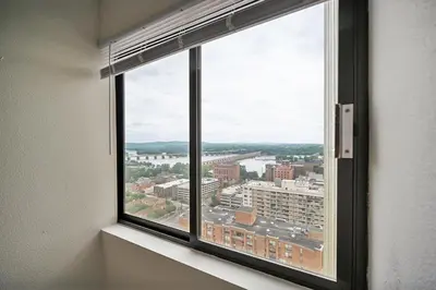 a window with a view of a city at PP 2312 Modern Corporate 1br, pool, Gym in Harrisburg