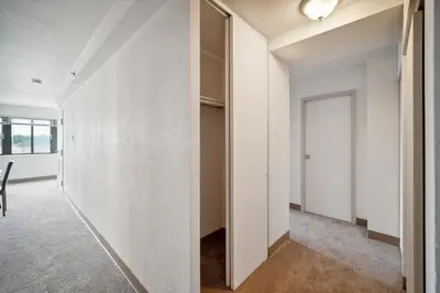 an empty hallway with white walls and a door at PP 501 Harrisburg Gem 2br, Pool, Parking in Harrisburg