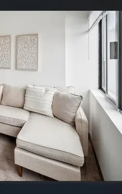 a living room with a couch and a chair at PP 501 Harrisburg Gem 2br, Pool, Parking in Harrisburg