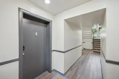 a hallway with a door in a room at PineBrook 914 I Popular 2Br Apartment for rent ! in Newark
