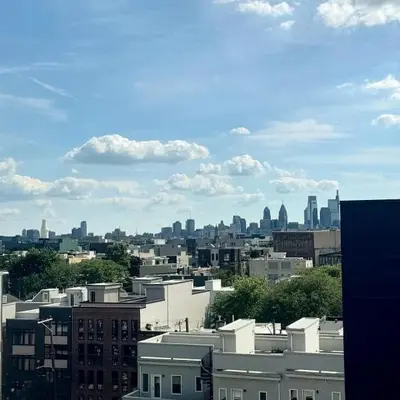 a view of a city skyline with buildings at Landing at Hagert and York 1 Bedroom in East Kensington in Philadelphia