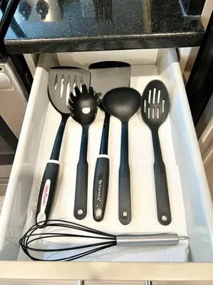 a utensil drawer with utensils in a sink at 403 Luxury and Comfy King bed in Central city of phily in Philadelphia