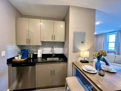 a kitchen with a sink and a counter top at 403 Luxury and Comfy King bed in Central city of phily in Philadelphia