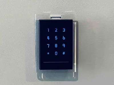 an alarm clock is attached to a wall at 406 Luxury KING BED in central city of Philad in Philadelphia