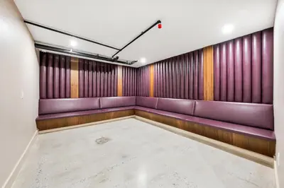 a room with purple leather seats in a room at Landmarked NYC Townhome - Sleeps 10 -Group-Friendly in New York