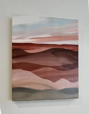 a painting of the desert on a white wall at Cozy Sanctuary in Jersey City