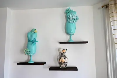 three vases sitting on shelves on a wall at Lovely Victorian Home with Bed and Breakfast Energy in West Bergen