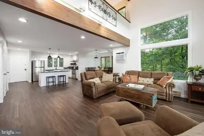 a large living room with a couch and a table at Pocono Mountains Village at Camelback 284 Overlook Way in Tannersville