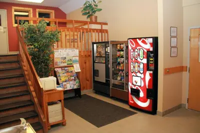 a store with a cocacola soda machine in a room at Pocono Mountains Village at Camelback 284 Overlook Way in Tannersville