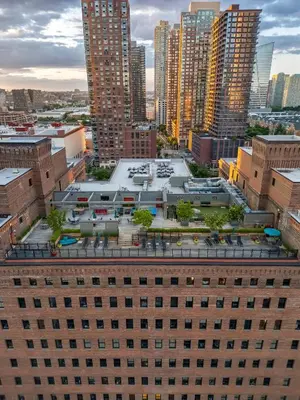 an aerial view of a large building in a city at The Othello - Luxury Industrial Loft near NYC in Communipaw
