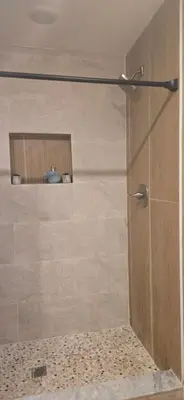 a shower with a glass door in a bathroom at Sparta lakehouse in Sparta