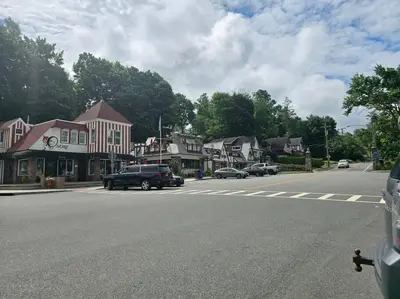 a town street with cars parked on the street at Sparta lakehouse in Sparta