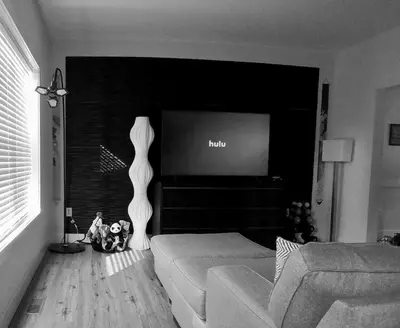 a living room with a couch and a flat screen tv at Perfect Family Getaway! Steps from Attractions in Hummelstown