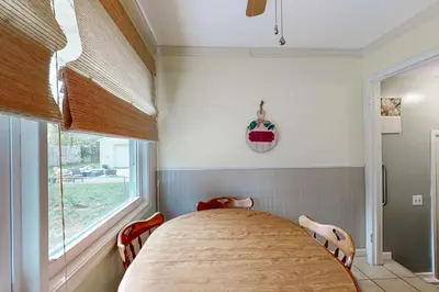 a bedroom with a large bed and a window at Work and Play! Home 1 Mi to Dtwn and Central Market in York