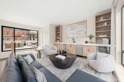 a living room with a couch and two chairs at Harlington by Rove Travel Private Backyard & Roof in New York