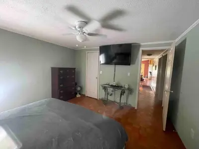 a bedroom with a bed and a ceiling fan at Most relaxing place on earth in Livingston Manor