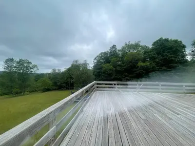 a wooden deck with a view of a field at Most relaxing place on earth in Livingston Manor