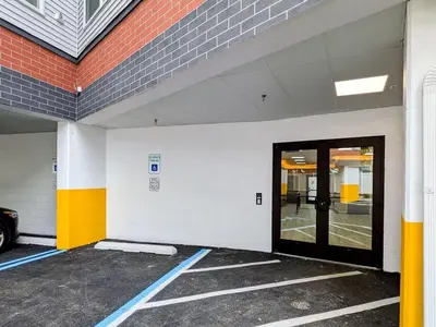 an empty parking lot with a door in a building at 224 Brand New 1 Bedroom 1 Bath 1 Kitchen 1 Liv in Dunellen