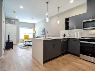 a large kitchen with a sink and a stove at 224 Brand New 1 Bedroom 1 Bath 1 Kitchen 1 Liv in Dunellen