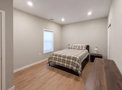 a bedroom with a bed and a window at 213 Brand New 3 Bedroom 2 Bath 1 Full Kit 1 Liv in Dunellen