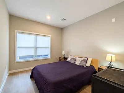 a bedroom with a bed and a window at 213 Brand New 3 Bedroom 2 Bath 1 Full Kit 1 Liv in Dunellen